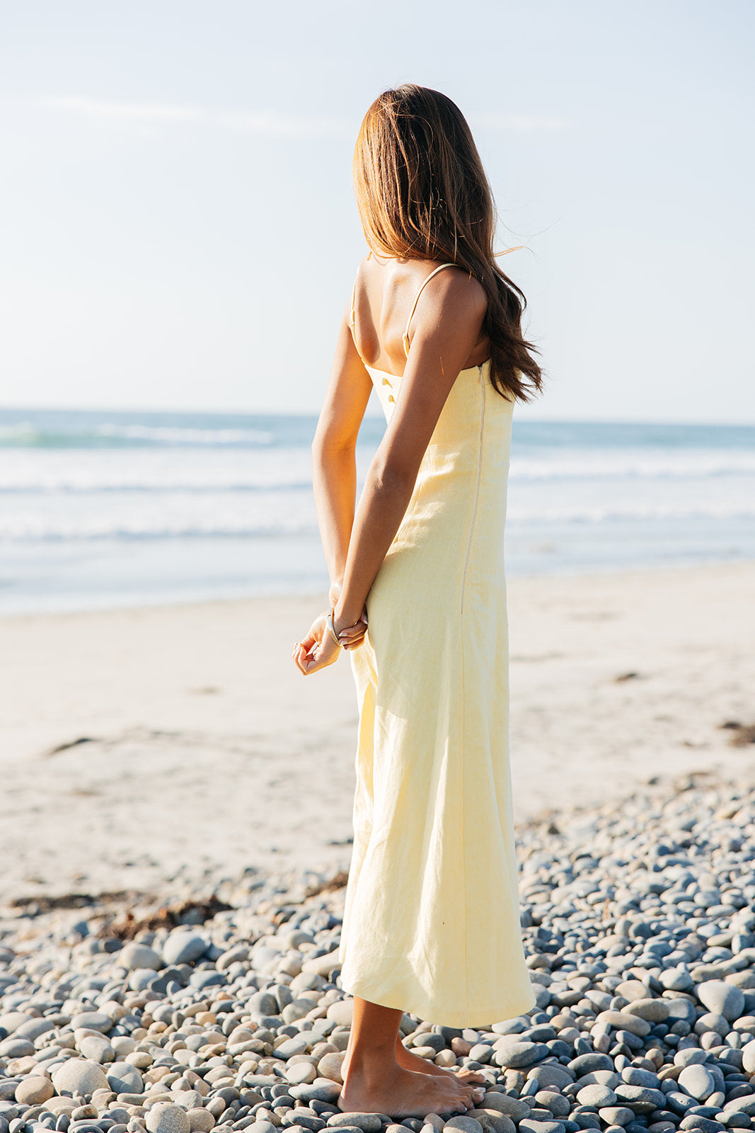High end yellow linen maxi dress with adjustable straps and button back