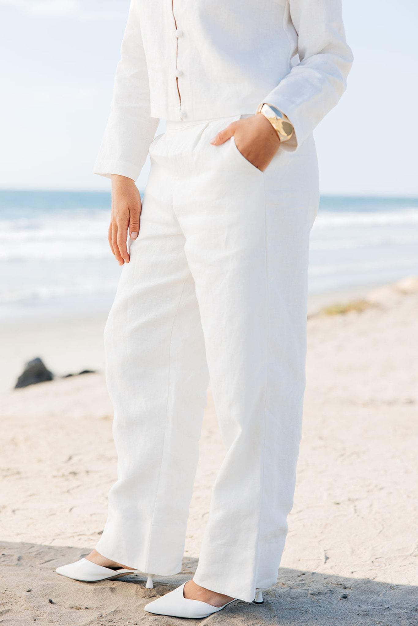 Side view of Lauren Linen Pants in white | Tailored and relaxed fit slacks with wide hem | linen