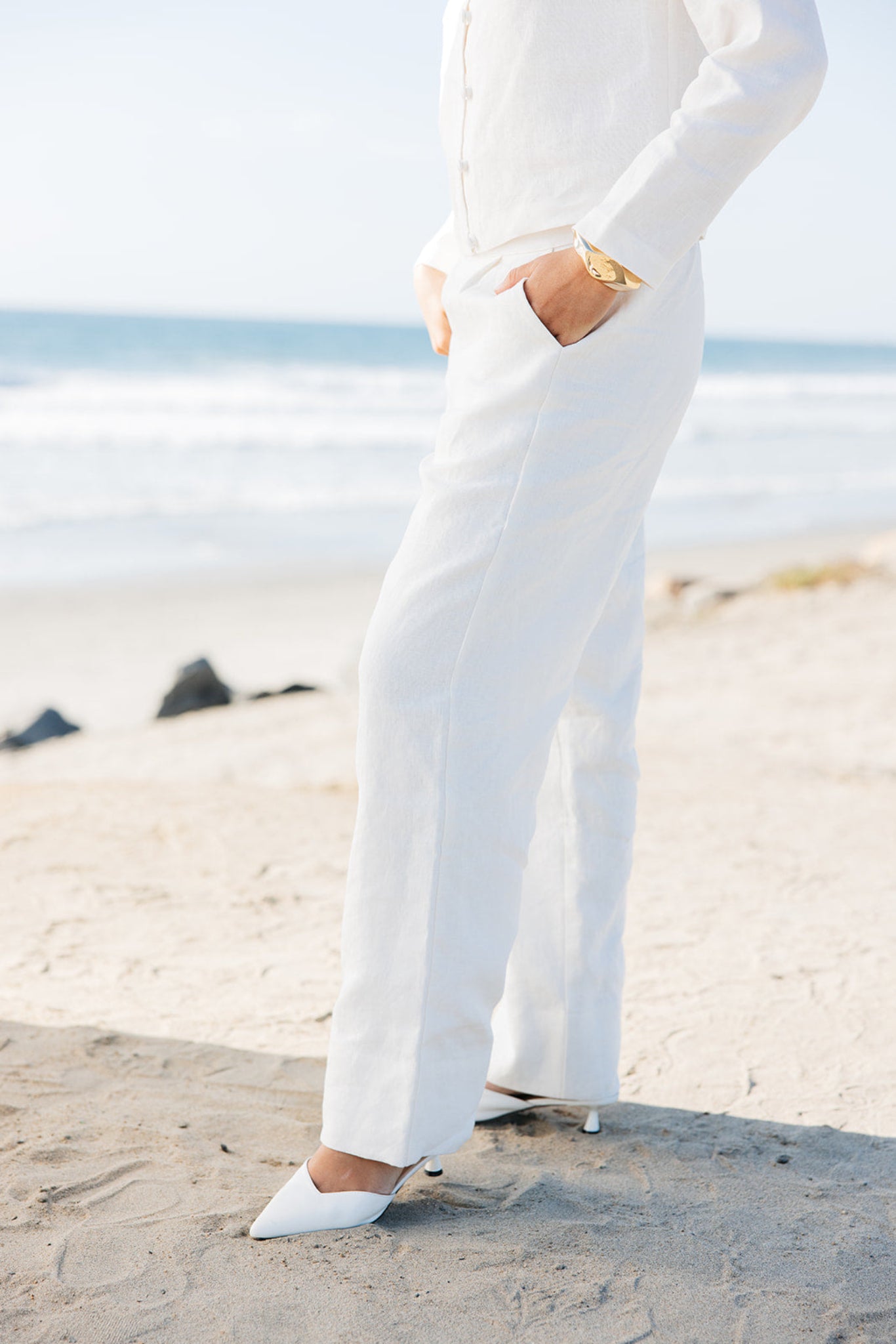 Side view of Lauren Linen Pants in white | Tailored and relaxed fit slacks with wide hem | linen