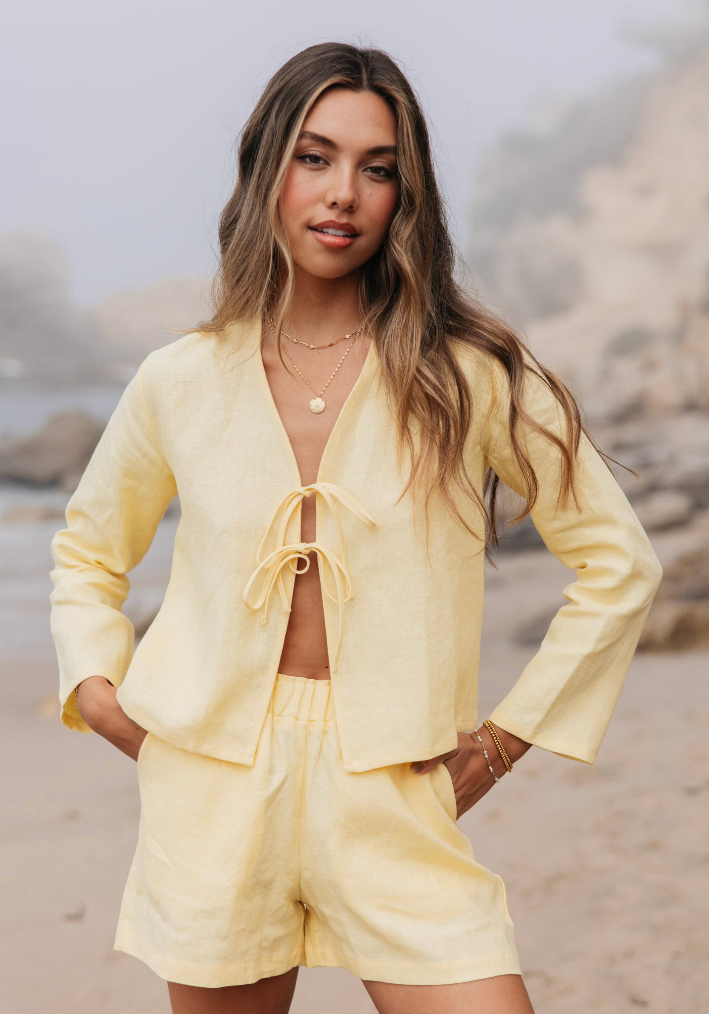 Classic butter yellow linen shorts with elastic waist. Pair with matching tie top for a cute summer set.