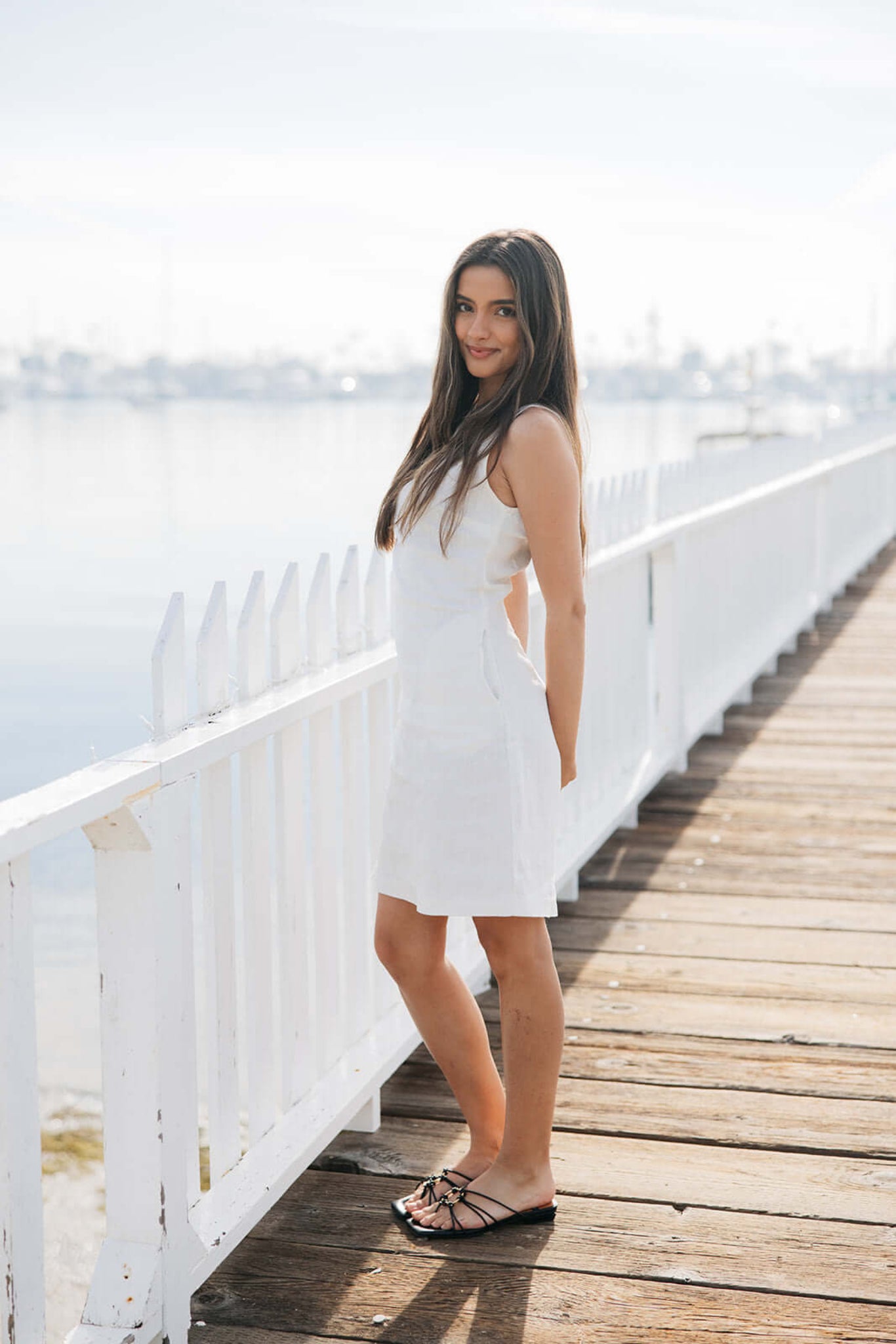 Side view of Jackie Linen Shift Dress in white | Structured shift dress with pockets | linen
