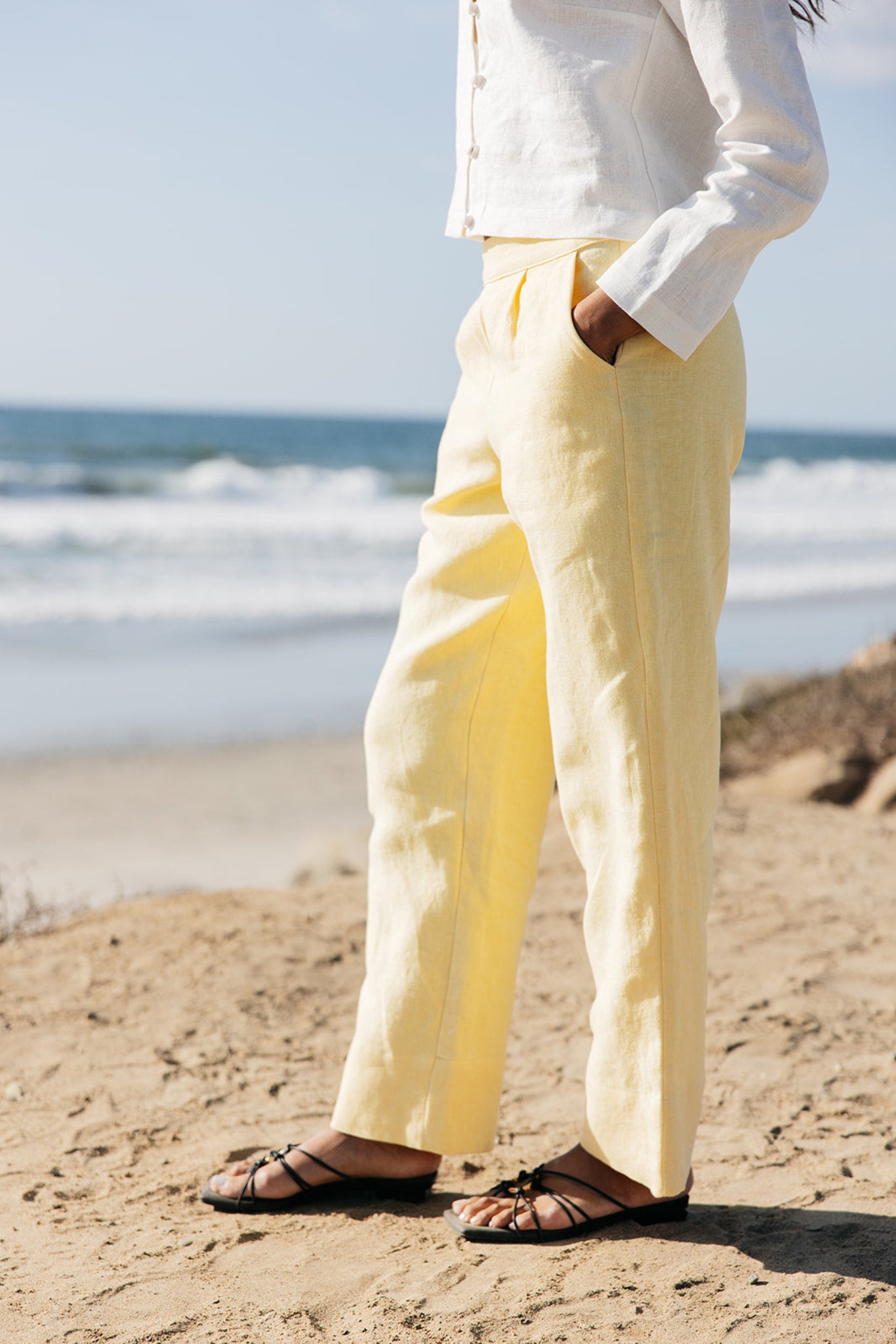 Side view of Lauren Linen Pants in yellow | Tailored and relaxed fit slacks with wide hem | linen